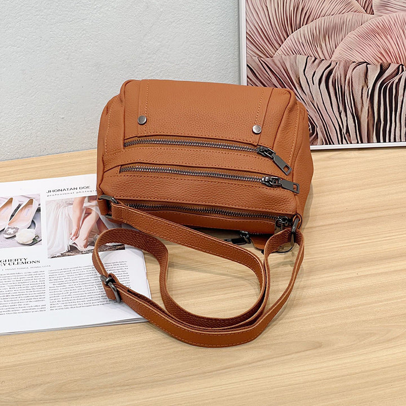 Sac à main en cuir de vache avec bande transversale en cuir véritable