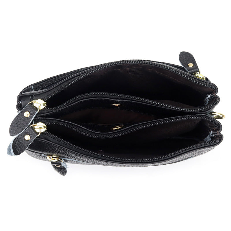 Les femmes petit sac de corps avec des compartiments multiples en cuir plein grain