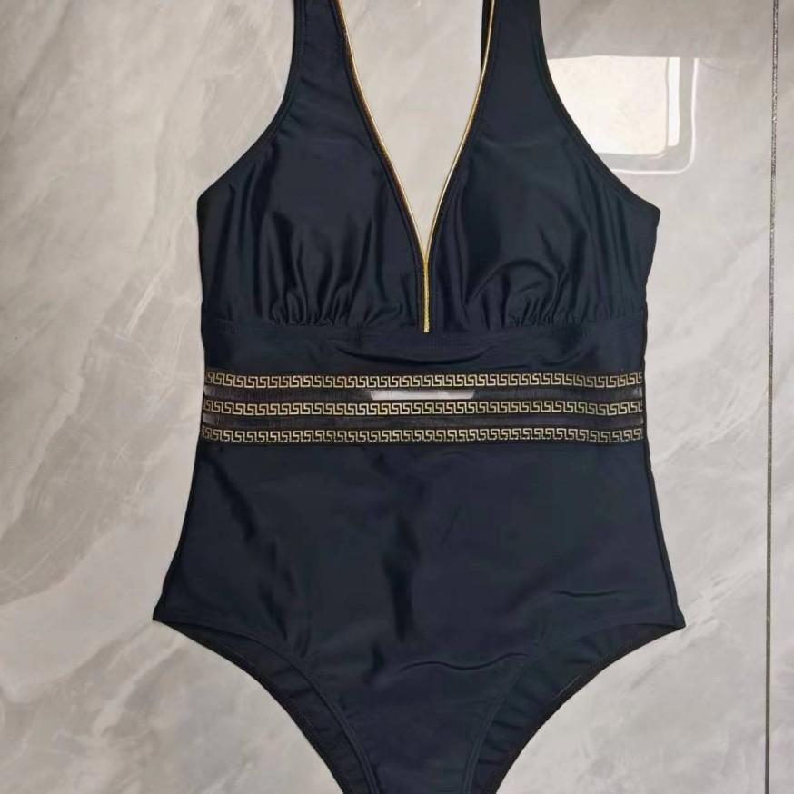 Maillot de bain en une pièce de couleur unie avec le ruban de détail pour les femmes