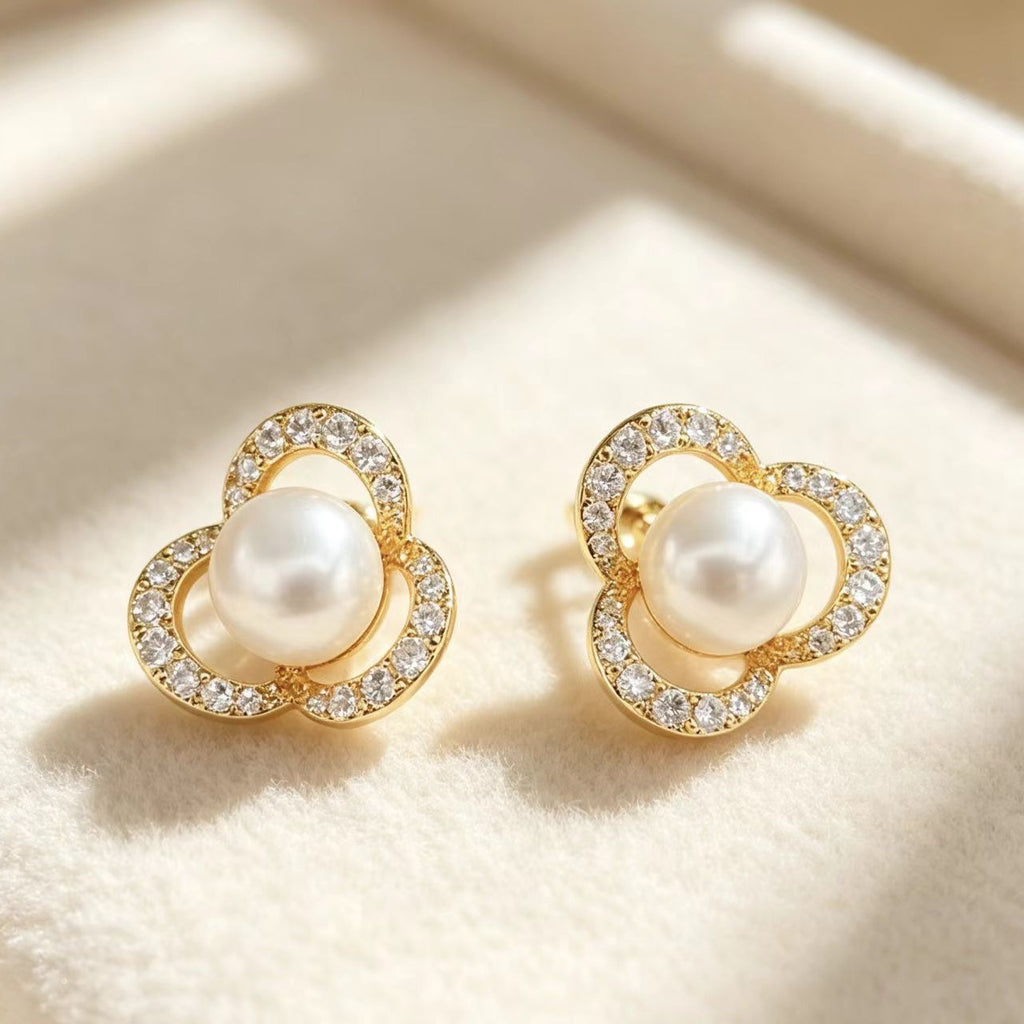 Boucles d'oreilles féminines en perles de Champagne incrustées de diamants à quatre feuilles
