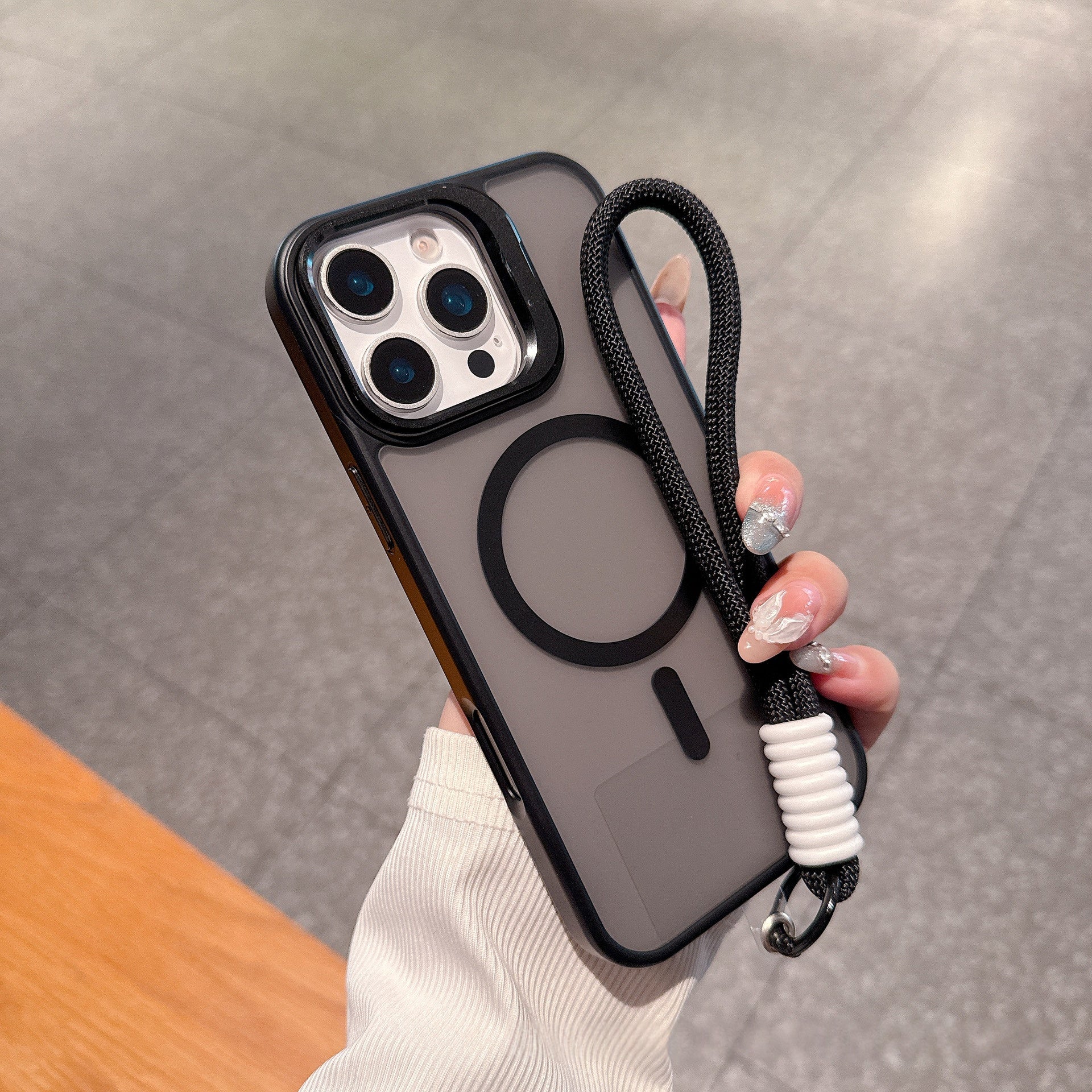Boîtier de téléphone magnétique à monture de lentilles
