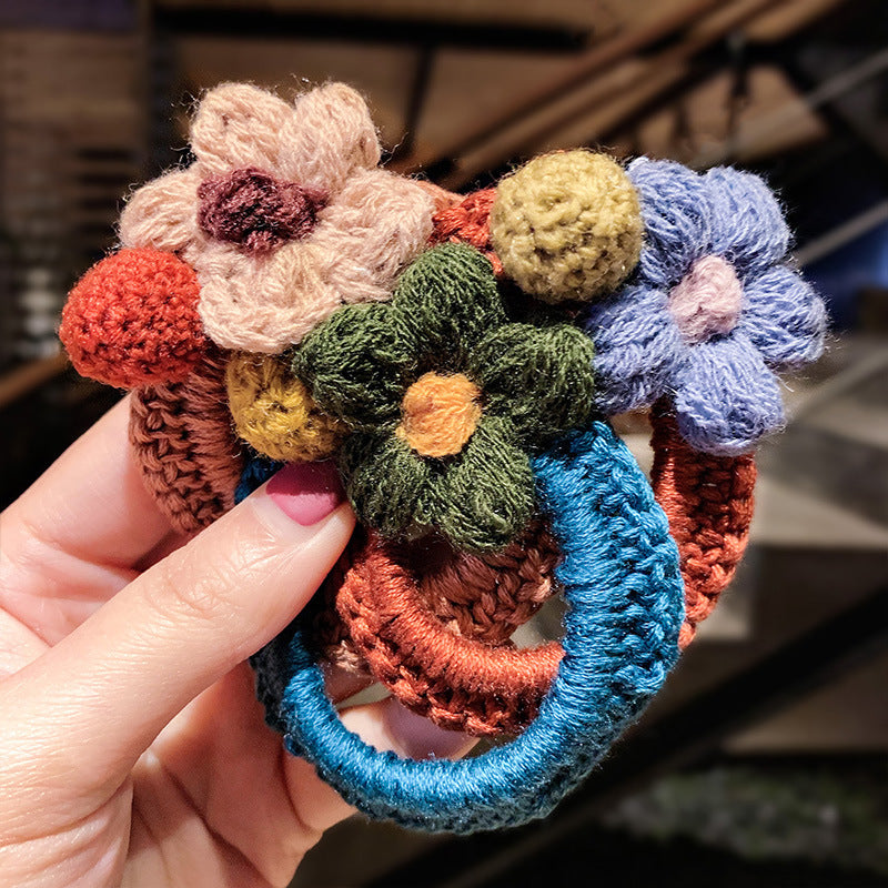 Fleurs de laine cravate cheveux élastique