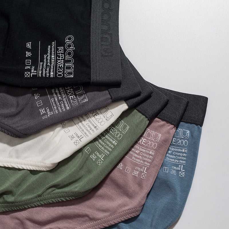 Slips de sous-vêtements modaux sans couture respirant pour homme
