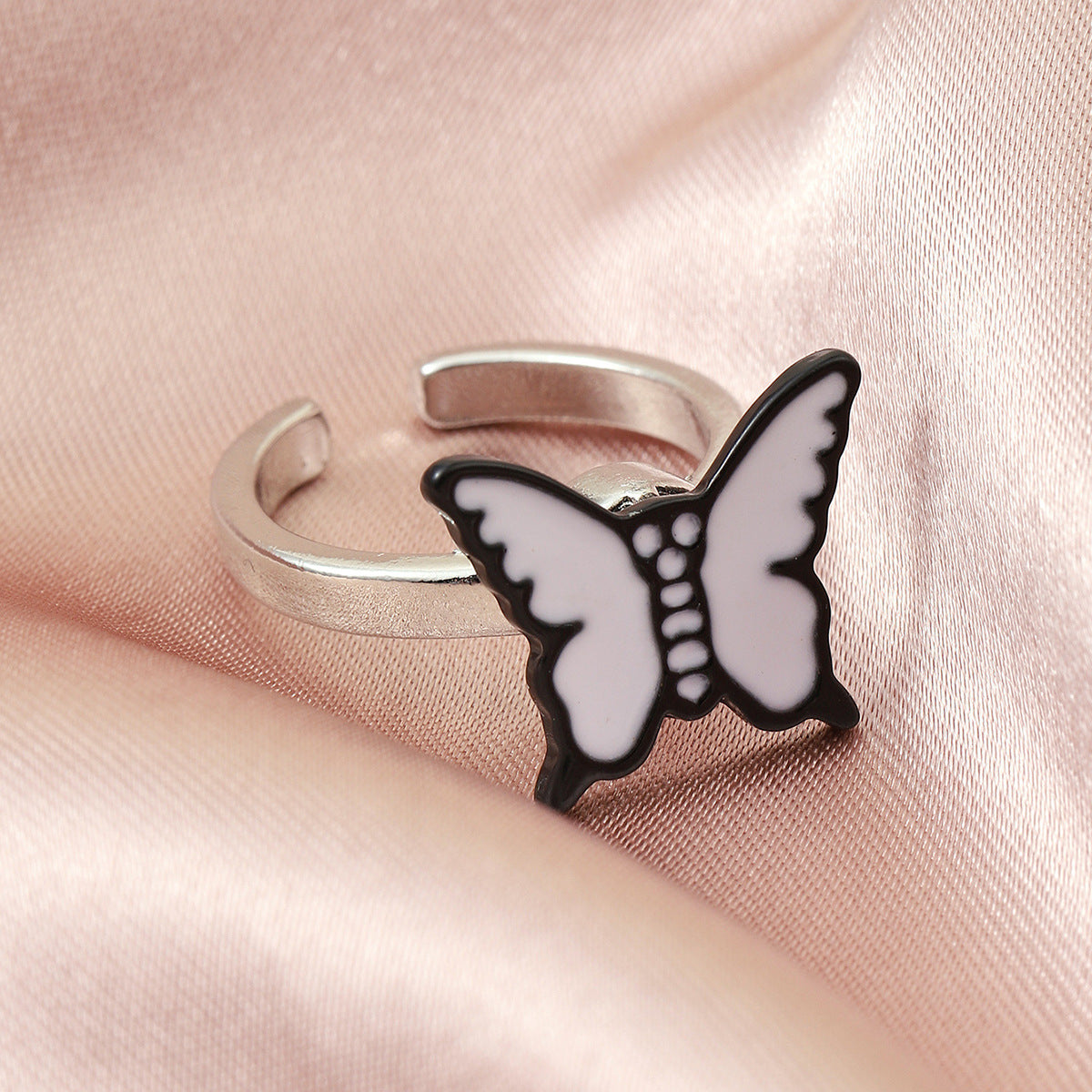 La mode La même douce bague tournante papillon