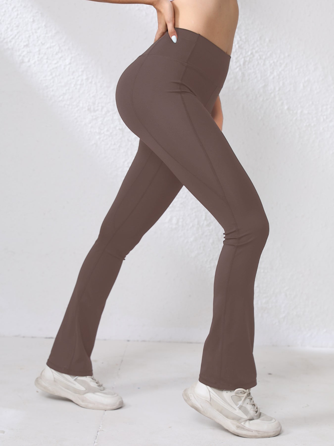 Pantalon de Yoga de style européen populaire Nude Yoga Porter des sports de plein air Sexy Solid Couleur Flared Lo