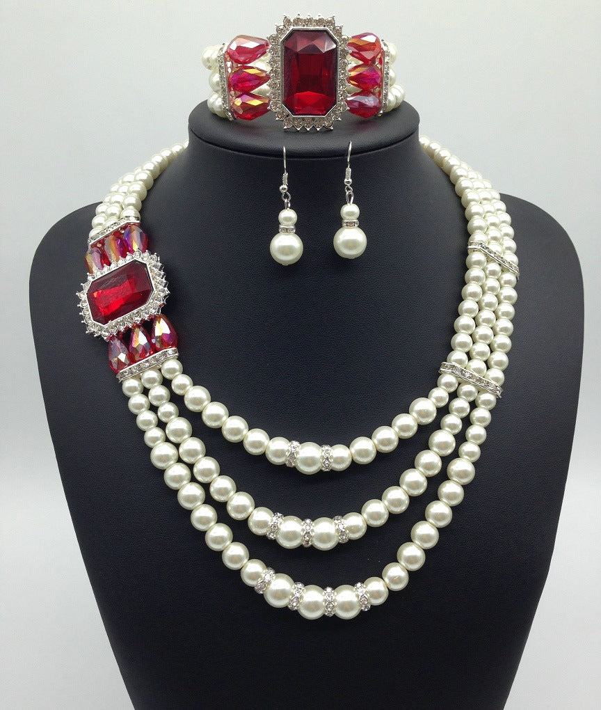 Boucles d'oreilles de mode européennes Diamond Gemstone Pearl Collier Set chaîne multi mariée bracelet t