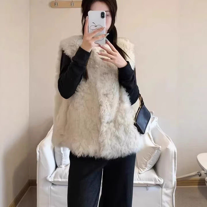 Veste en cuir et en fourrure mi-longueur