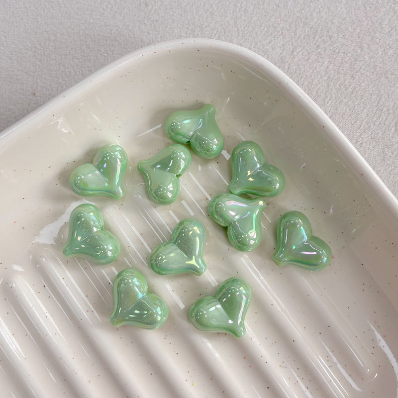 Perles acryliques du coeur irisées