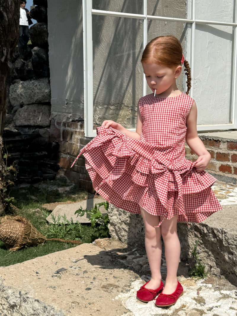 Robe à carreaux sans manches de fille avec arc rouge et jupe à manches multiples