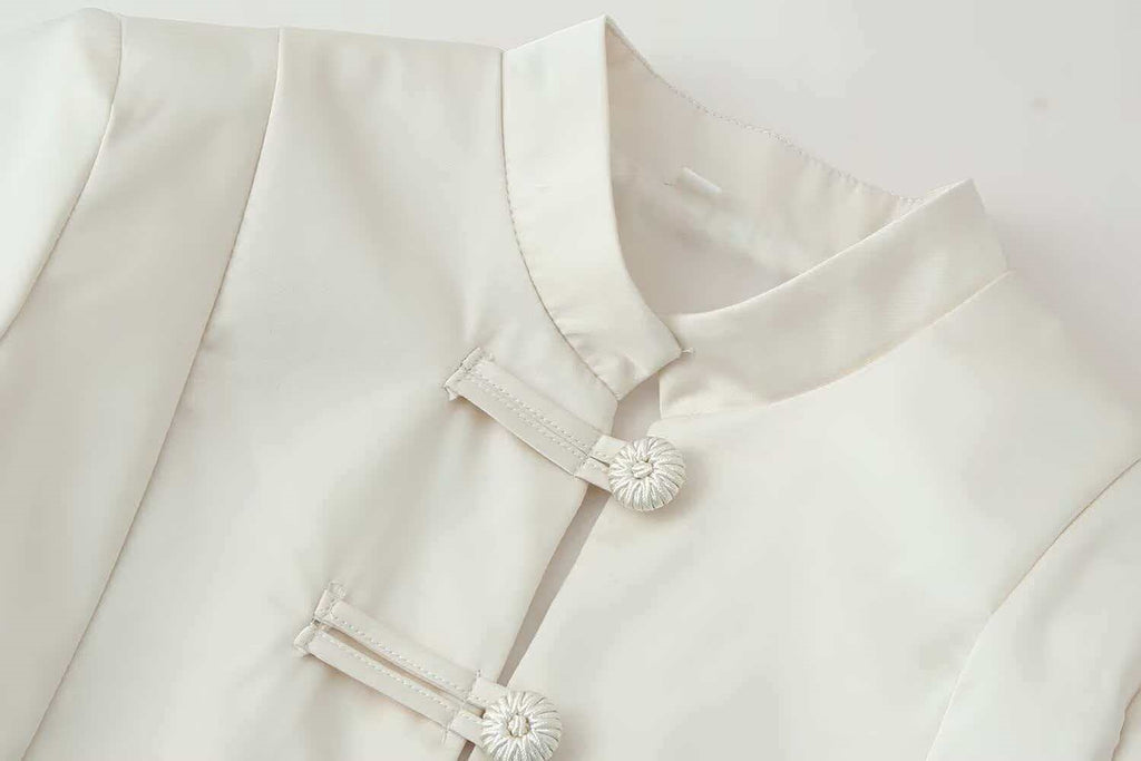Veste de cache-pierre de ressort polyvalente devant bouton