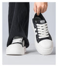 La taille augmente les chaussures pour hommes