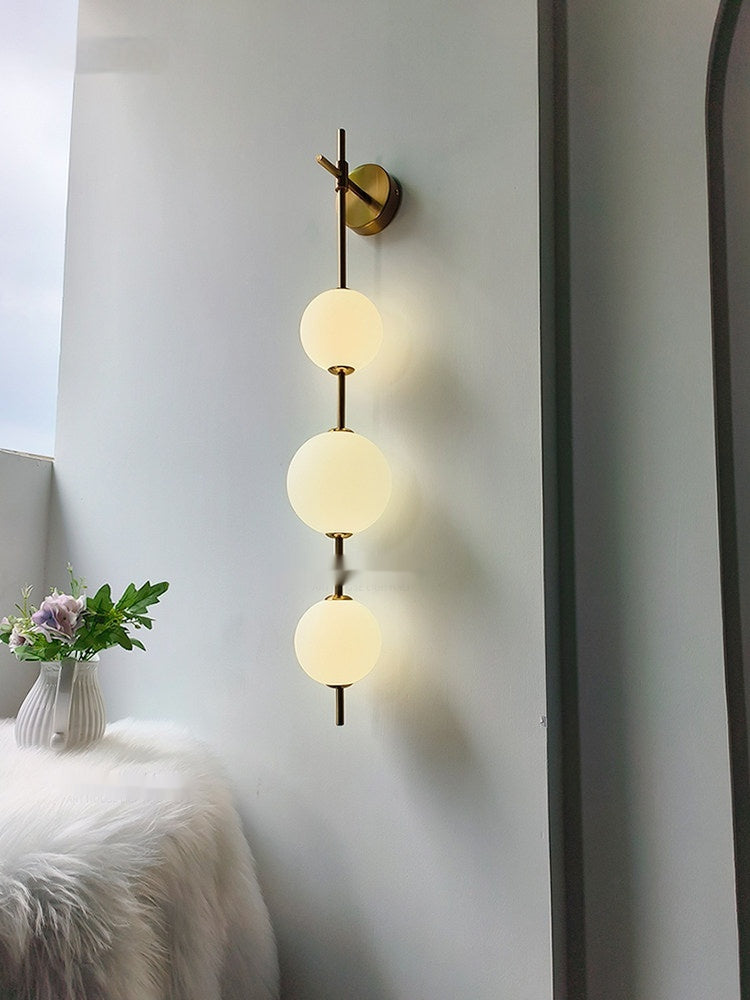 Lampe murale côté lit - Lampe perle