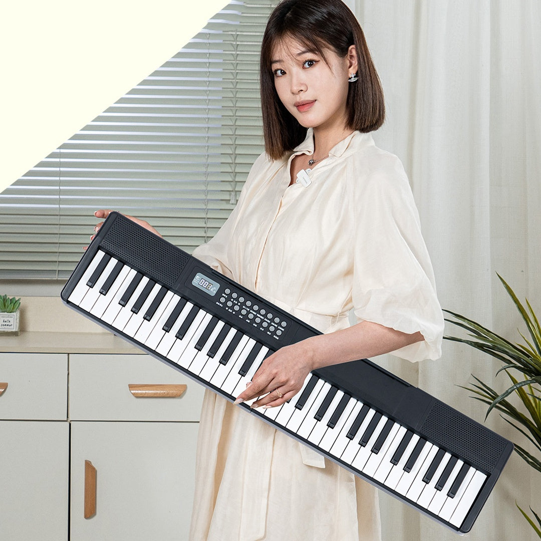 Chargement Portable Smart pliage 61 Piano à clé