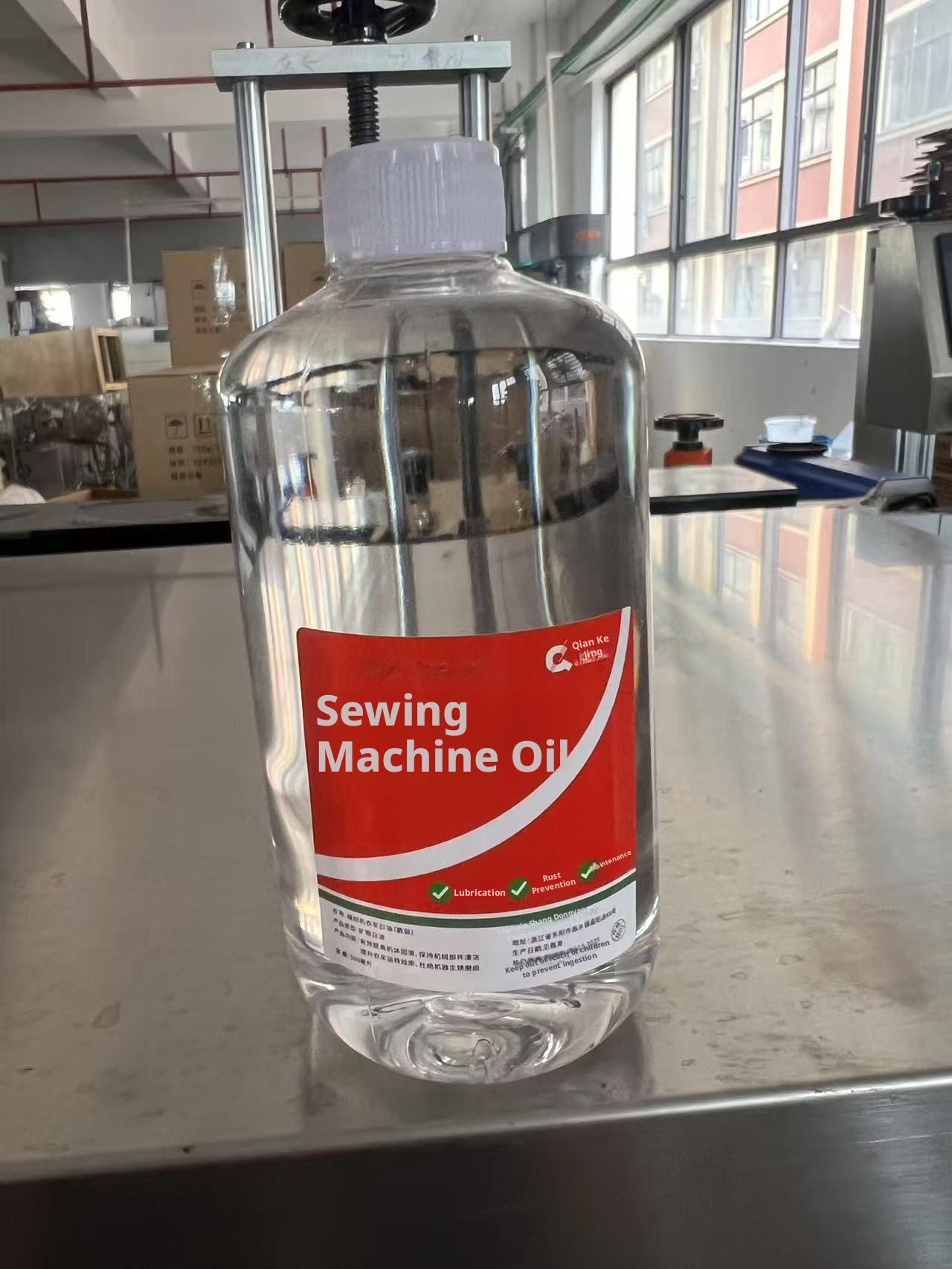Lubrification à l'huile de la machine à coudre