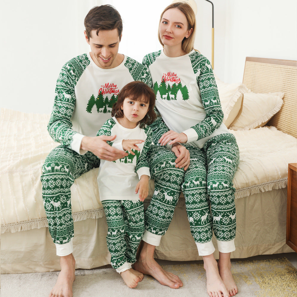 Ensemble de famille de Noël de parents et d'enfants en couleur de col rond imprimé