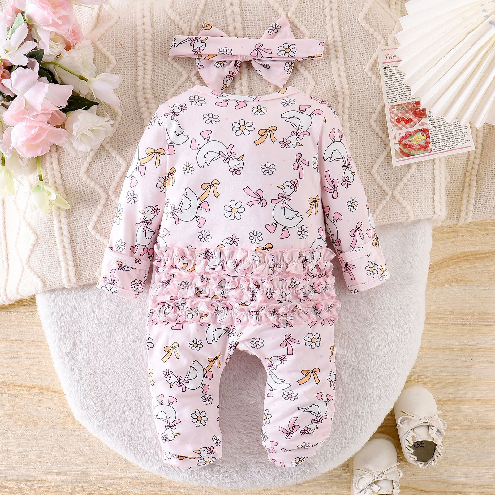 Mignon bébé fille à manches longues Combinaison avec une petite impression de canard