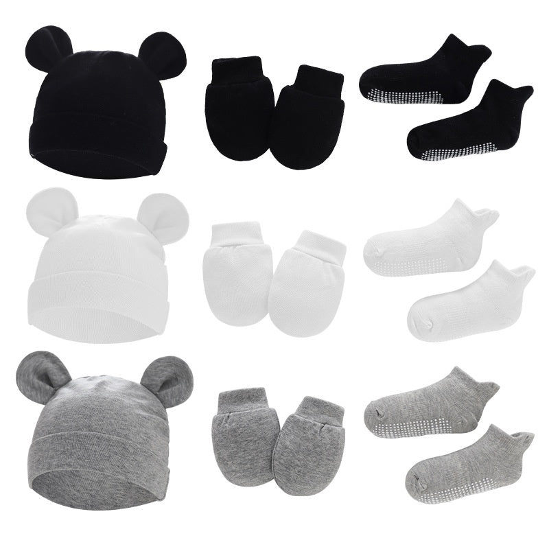 Chapeau nouveau-né Mittens et chaussettes avec des chaussures en caoutchouc