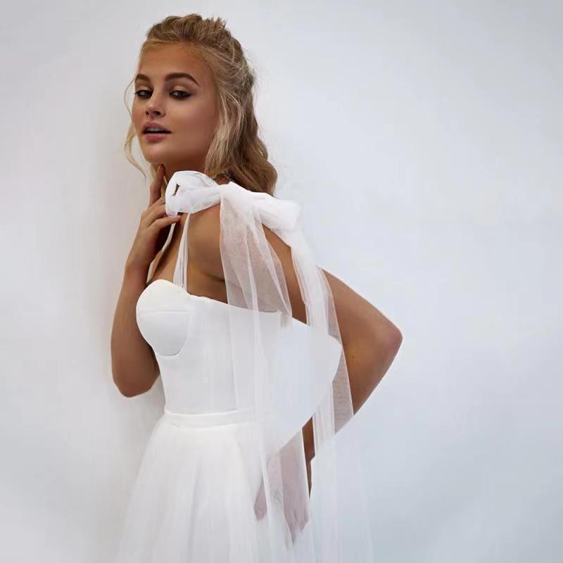 Robe de mariée sans pli de style français avec un arc avec un train Tulle