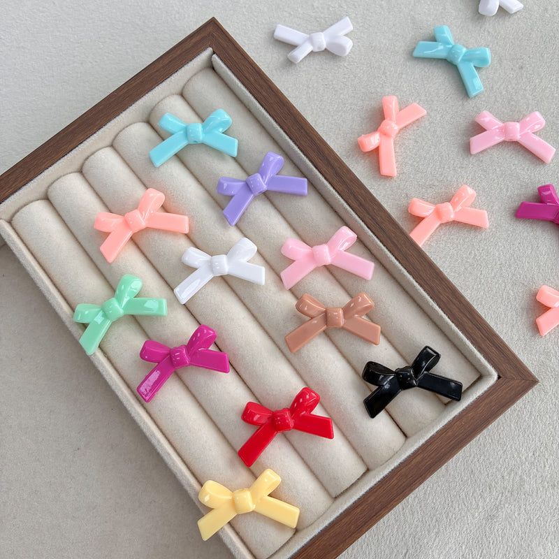 Perles d'espacement en forme de Bowknot acrylique