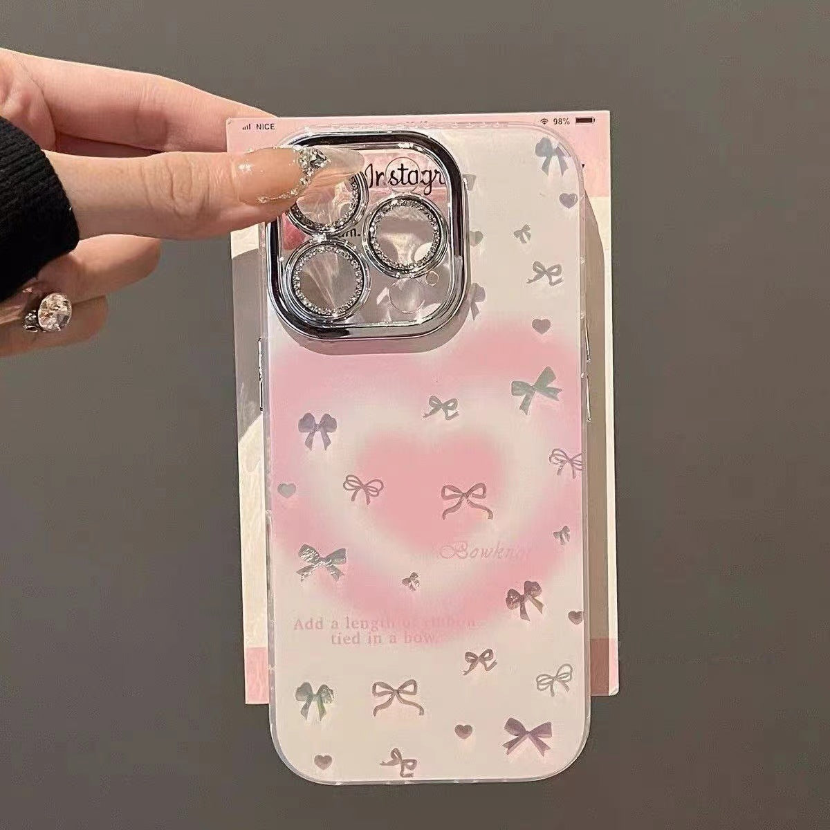 Cas de téléphone brouillé de coeur Bow