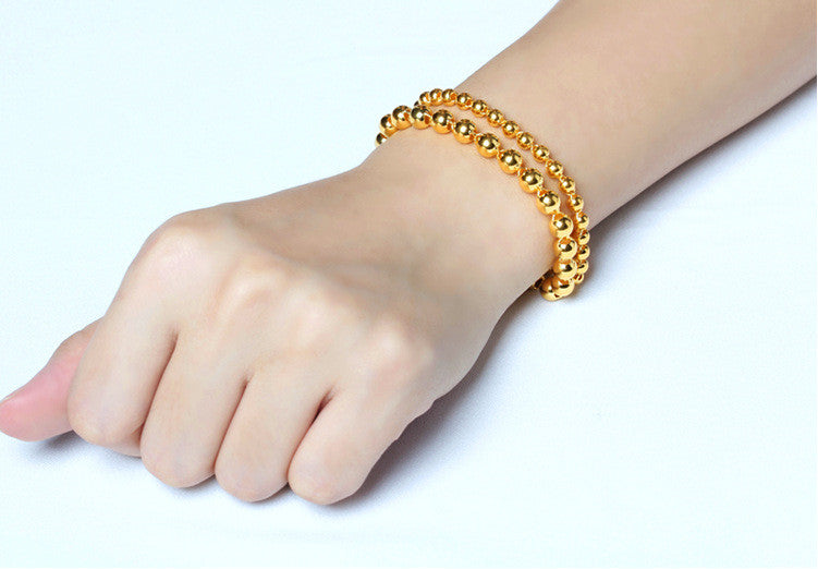 Bracelet en perles rond homme avec imitation or 24k