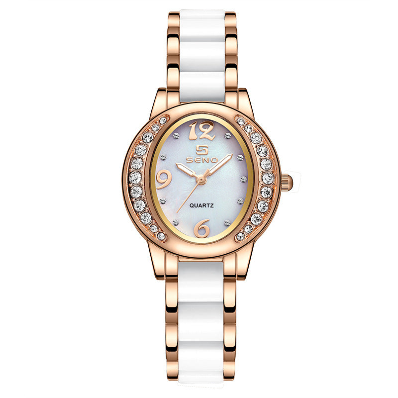 Femmes Montre élégant Oval Diamond incrusté Imperméable Quartz Montre avec une lumière Di
