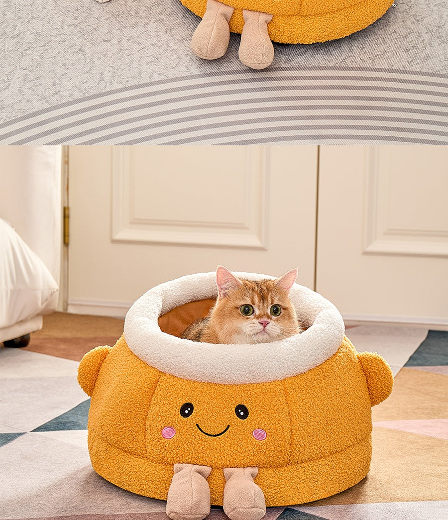 Lit de chat avec sourire orange