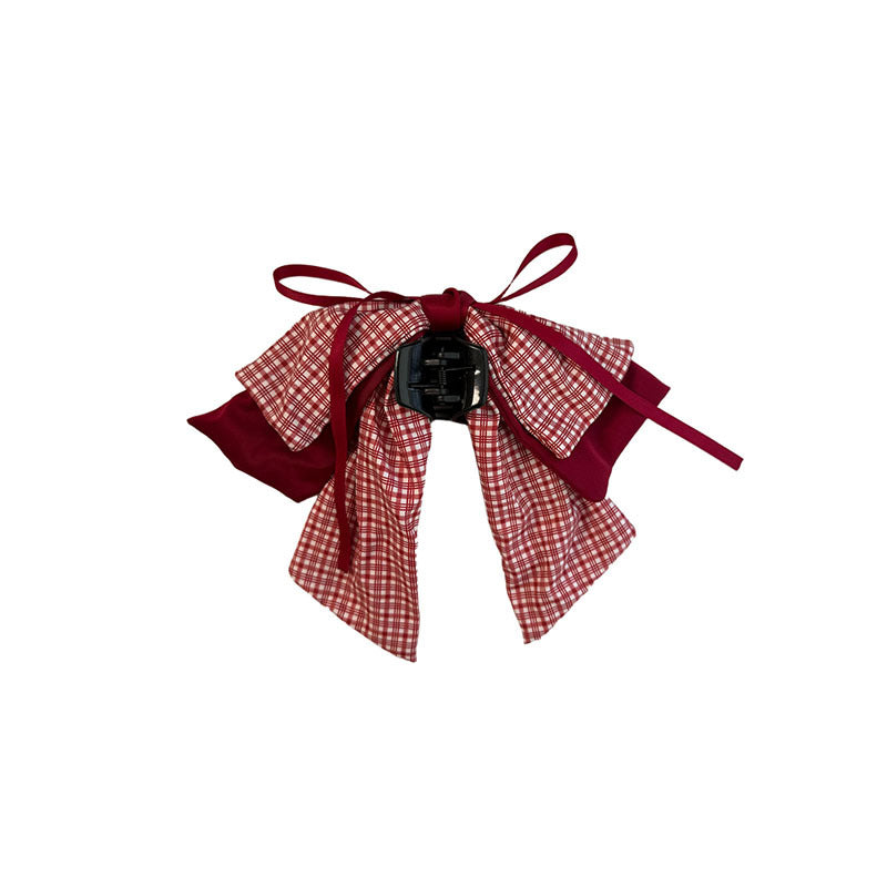 Clip à cheveux de style princesse de petite fille avec un arc rouge