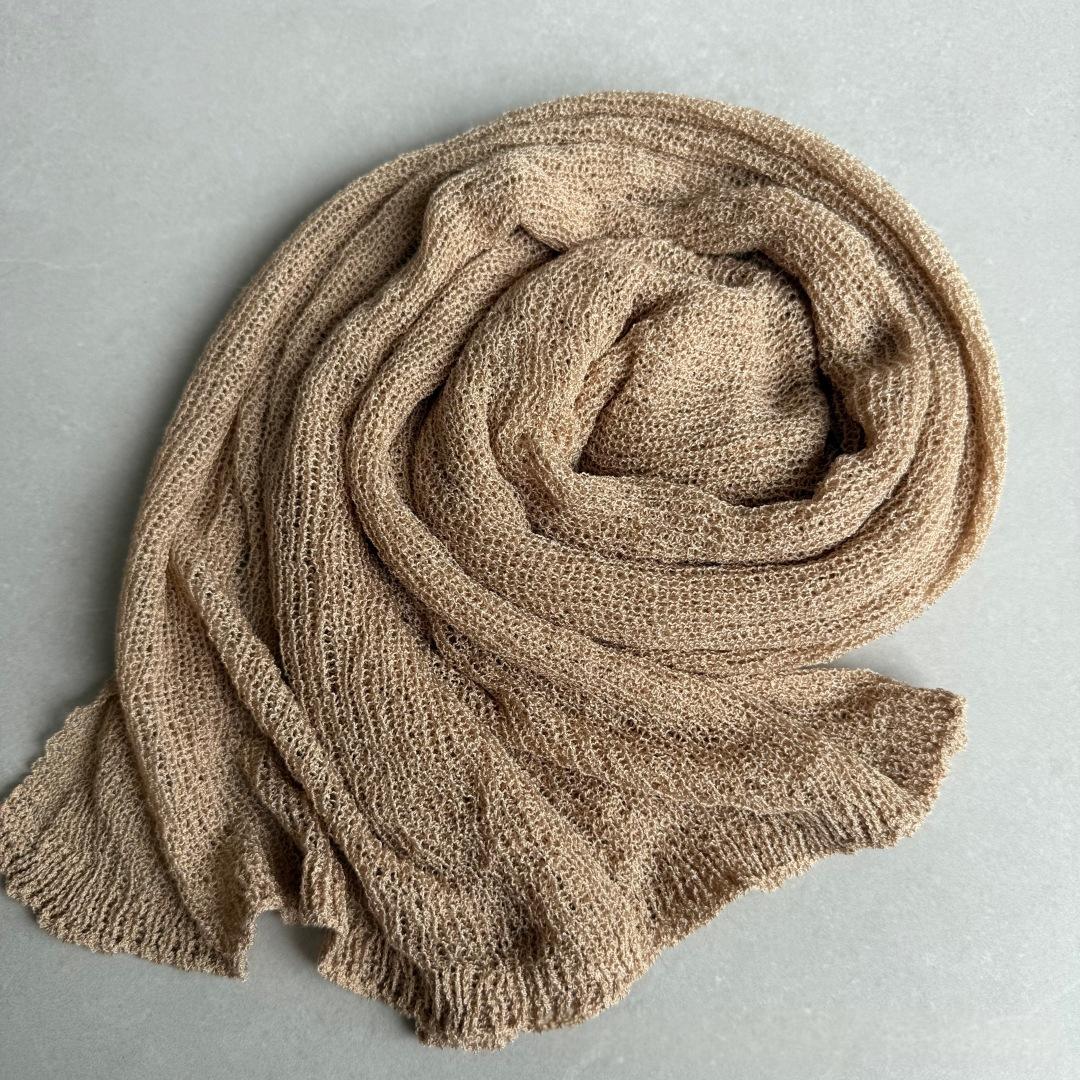 Cape à mailles creuses et protectrices du soleil