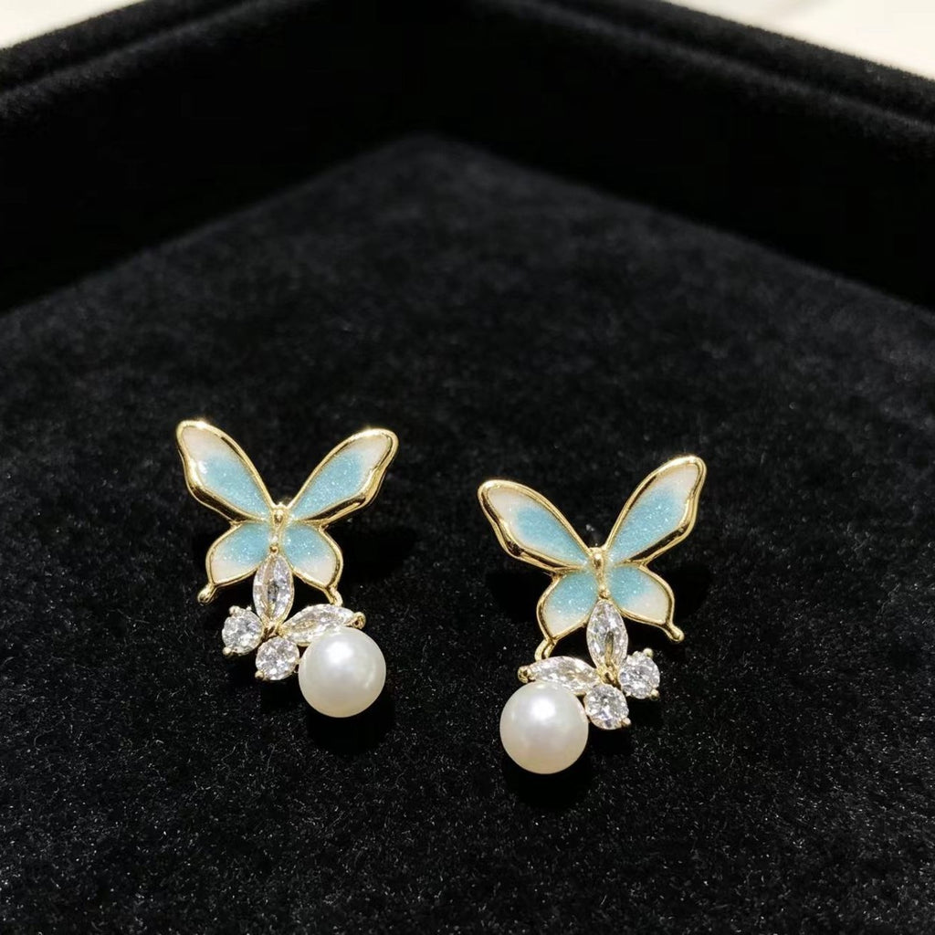 Boucles d'oreilles Élégantes à aiguilles en argent haut de gamme Pearl Butterfly
