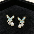 Boucles d'oreilles Élégantes à aiguilles en argent haut de gamme Pearl Butterfly