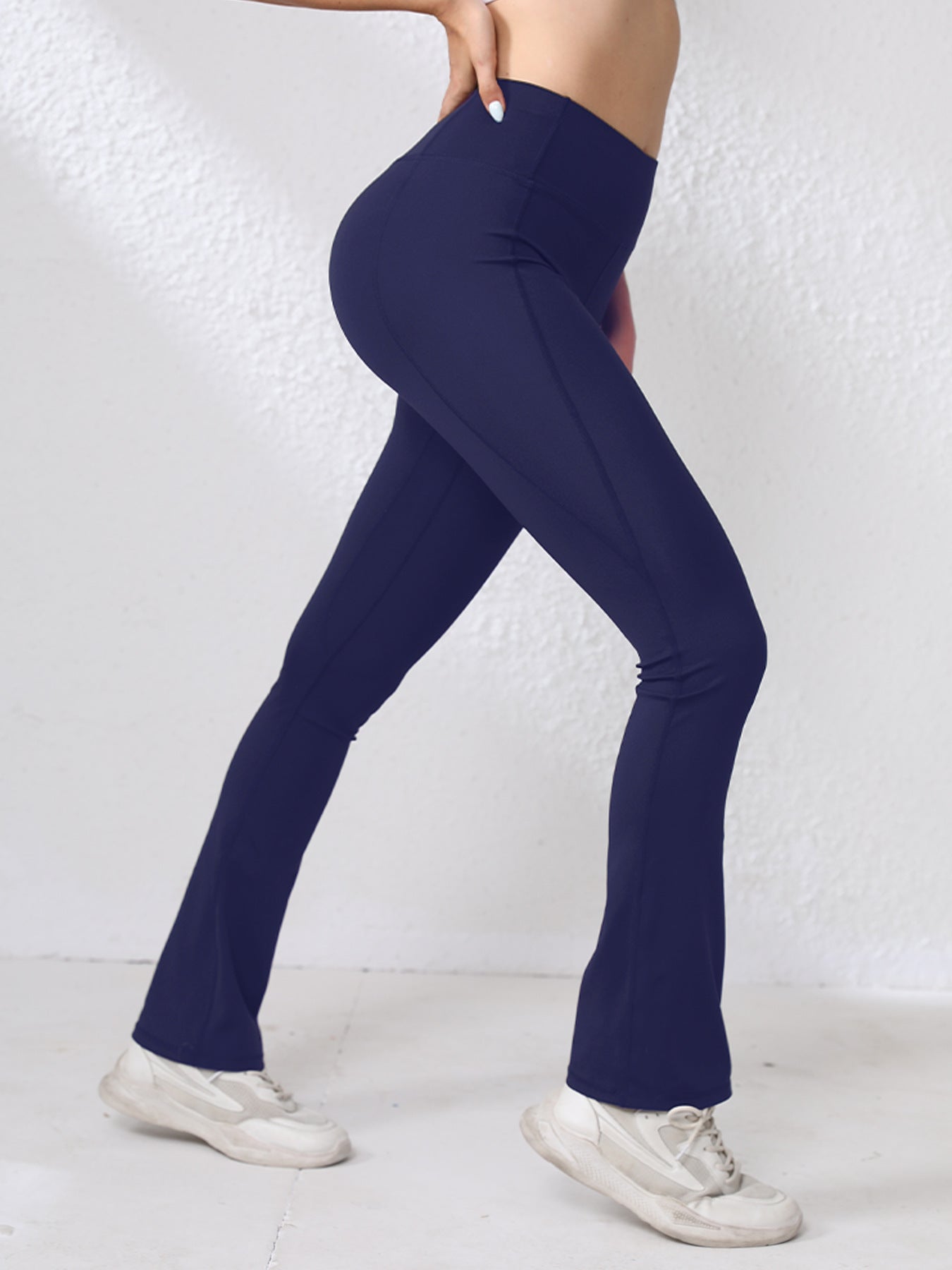 Pantalon de Yoga de style européen populaire Nude Yoga Porter des sports de plein air Sexy Solid Couleur Flared Lo