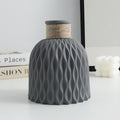 Vase-gray-1 ondulé d'eau en plastique