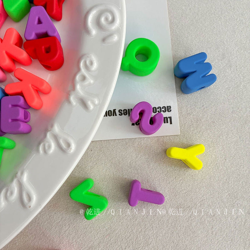 Perles en acrylique caoutchouteux