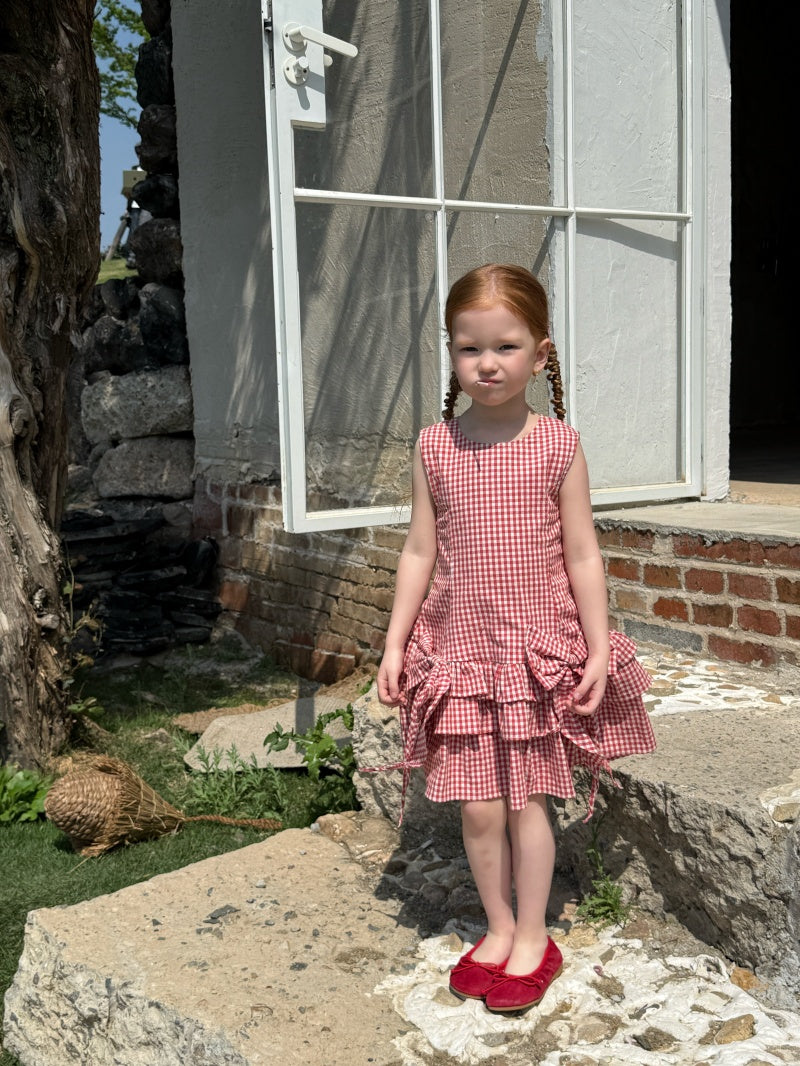 Robe à carreaux sans manches de fille avec arc rouge et jupe à manches multiples