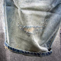 Short en denim brodé pour hommes