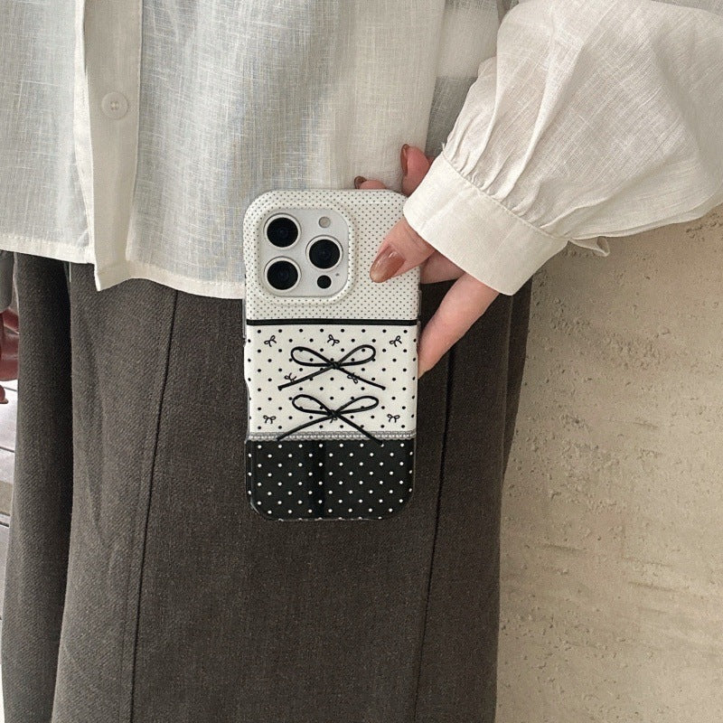 Noir et blanc Polka Dot pointant Stereo Bow cas téléphone