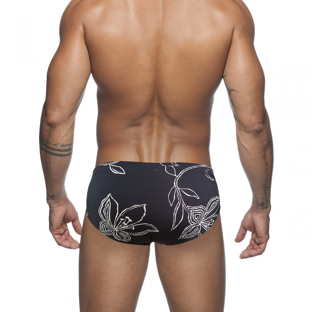 Fond noir Fleur blanche Trunks de natation simples