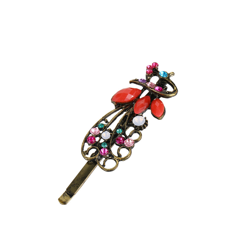 Clip à cheveux vintage en strass couleur paon