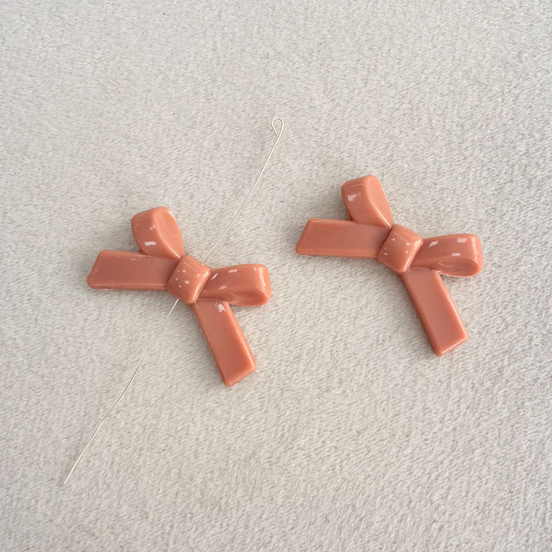 Perles d'espacement en forme de Bowknot acrylique