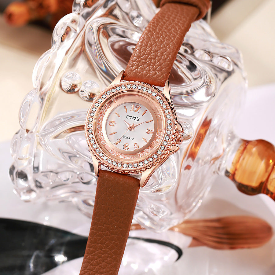 Élégante et minimaliste montre féminine ronde en strass