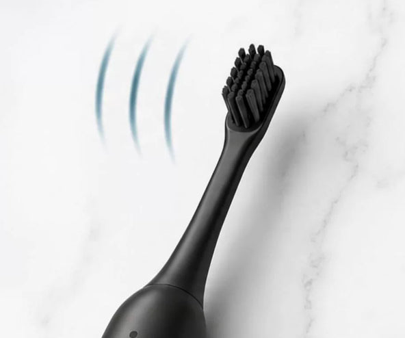 Brosse à dents électrique à levis magnétique ménager