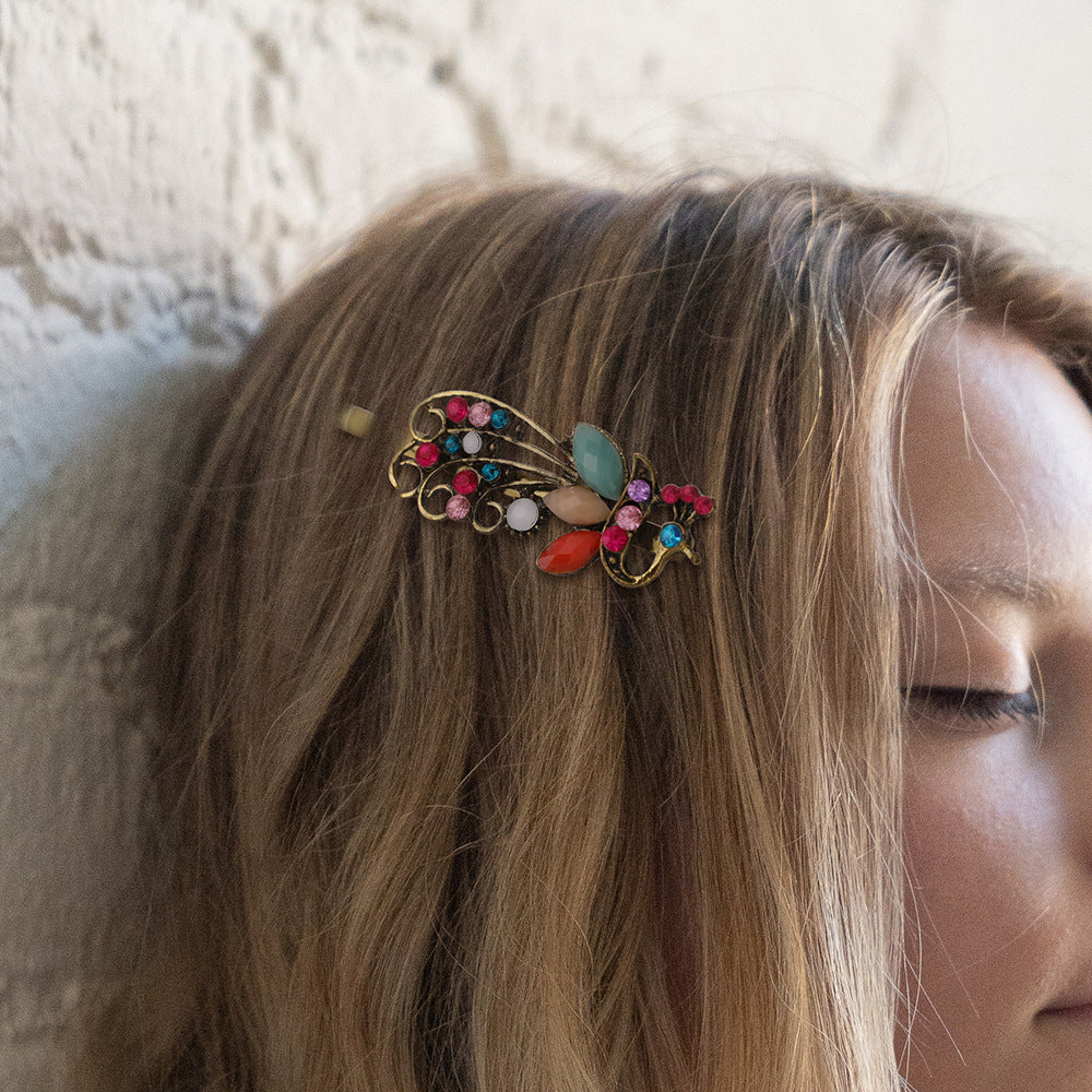 Clip à cheveux vintage en strass couleur paon