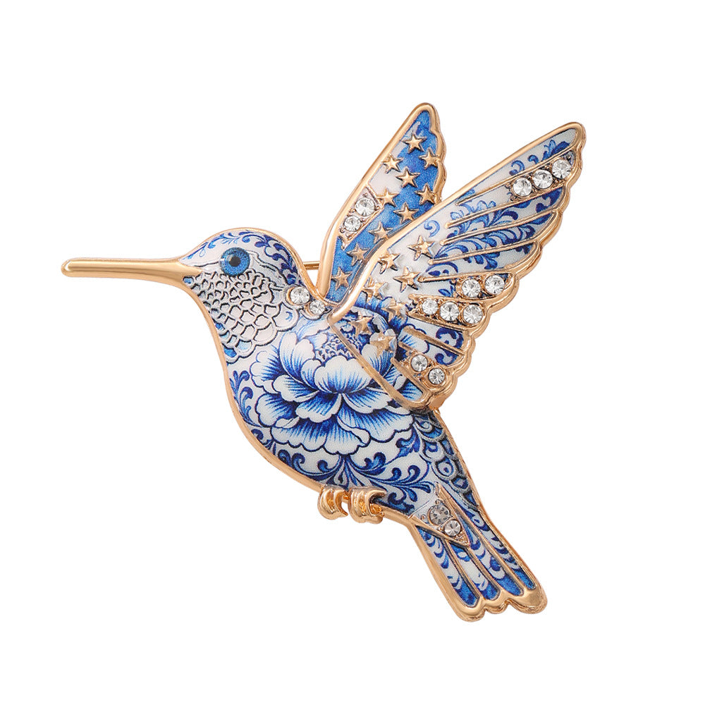 Drapeau et thème du soccer en métal de colibri peint
