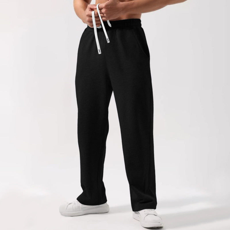 Sweatpants à cordons élastiques de couleur solide mâle