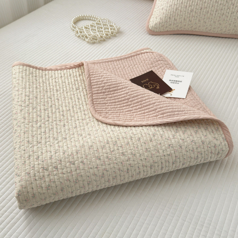 Double-sided pure cotton quilted throw