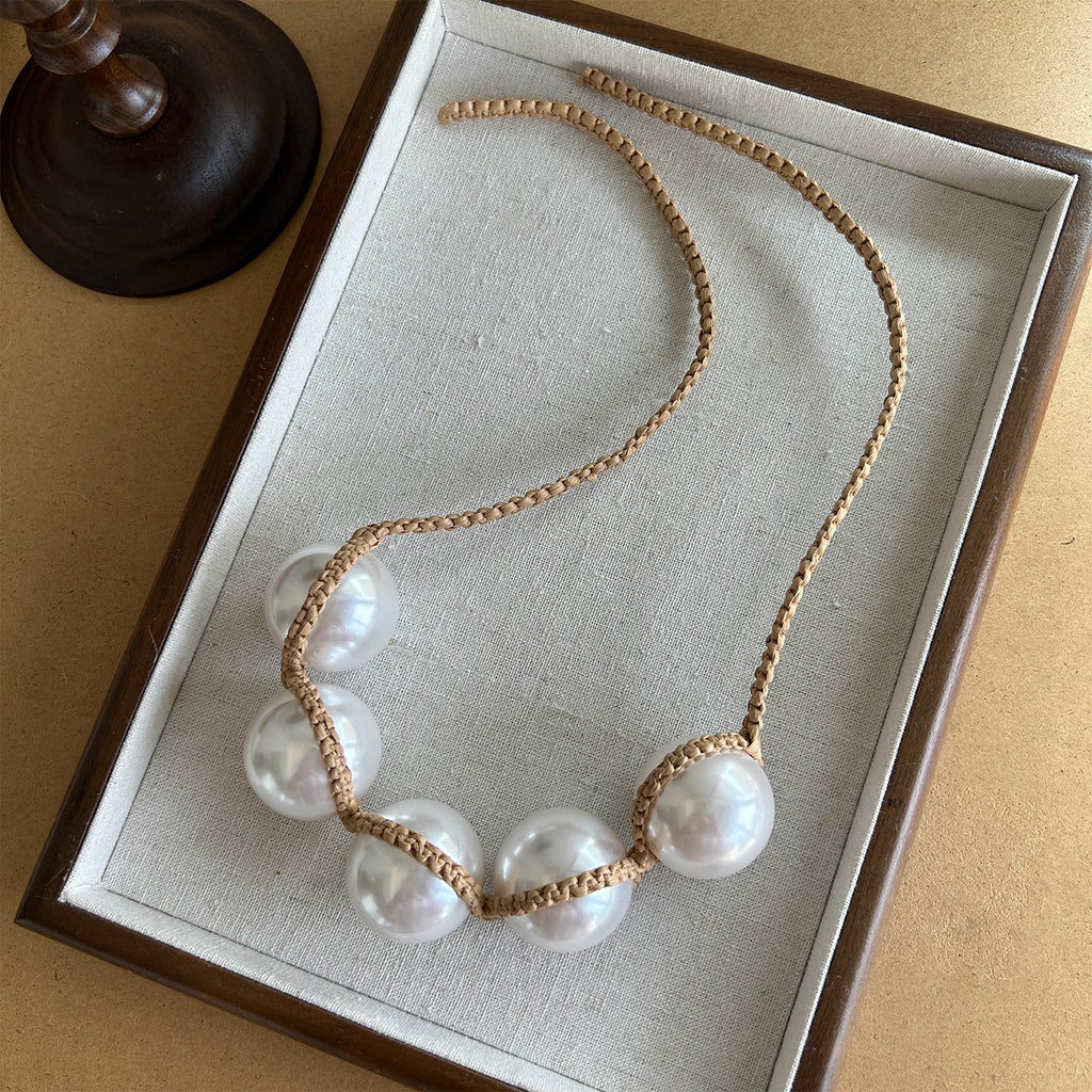 Collier tressé Pearl Raffia