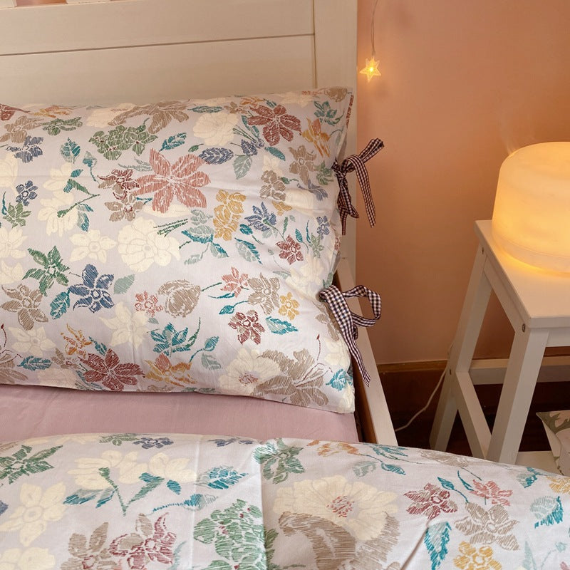 Ensemble de literie à quatre pièces en coton floral rétro nu
