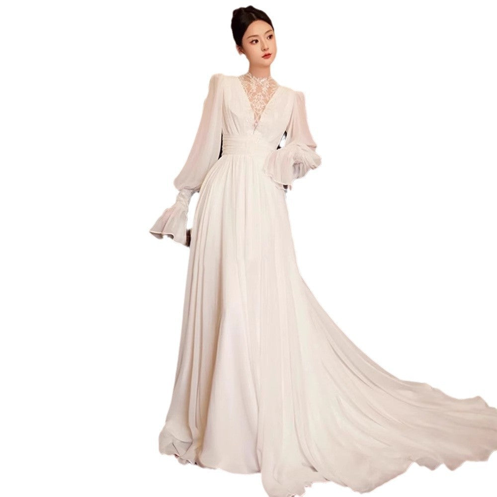 Robe de mariée vintage en dentelle de style français avec manches de puff