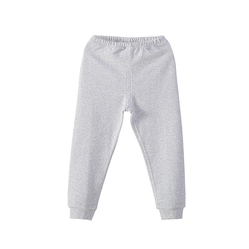 Les garçons et les filles gardent les leggings élastiques chauds